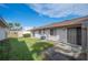 Private backyard with patio and grassy area at 4241 Oak Loop # 36, Mulberry, FL 33860