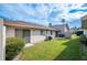 Spacious backyard with grassy lawn and patio at 4241 Oak Loop # 36, Mulberry, FL 33860
