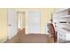 Bright bedroom with a built-in desk, chair, and spacious closet at 4241 Oak Loop # 36, Mulberry, FL 33860
