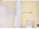 Small bathroom with shower/tub combo and white curtain at 4243 Oak Loop # 35, Mulberry, FL 33860