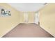 Spacious bedroom with neutral walls and carpet flooring at 4243 Oak Loop # 35, Mulberry, FL 33860