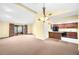 Open concept kitchen and living area with modern appliances at 4243 Oak Loop # 35, Mulberry, FL 33860