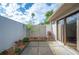 Small, private patio with well-maintained landscaping at 4243 Oak Loop # 35, Mulberry, FL 33860