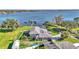 Stunning lakefront home featuring a private dock and a refreshing pool at 809 Fairlane Dr, Lakeland, FL 33809