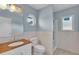 Bathroom with granite vanity and shower/tub combo at 809 Fairlane Dr, Lakeland, FL 33809