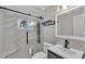 Modern bathroom with walk-in shower and vanity at 809 Fairlane Dr, Lakeland, FL 33809