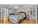 Comfortable bedroom with hardwood floors and ample closet space at 809 Fairlane Dr, Lakeland, FL 33809