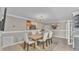 Bright dining room with a farmhouse table and chandelier at 809 Fairlane Dr, Lakeland, FL 33809