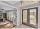 Bright entryway with double doors and office view at 809 Fairlane Dr, Lakeland, FL 33809