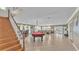 Game room with pool table, view of water, and staircase at 809 Fairlane Dr, Lakeland, FL 33809