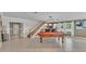 Game room with pool table and view into entryway at 809 Fairlane Dr, Lakeland, FL 33809