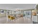 Living room with sectional sofa and access to a patio at 809 Fairlane Dr, Lakeland, FL 33809