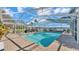 Inviting screened pool with lake view at 809 Fairlane Dr, Lakeland, FL 33809