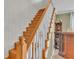 Wooden staircase with white railings at 809 Fairlane Dr, Lakeland, FL 33809