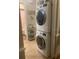 Laundry room with stacked washer and dryer at 110 Hidden Arbor Ct, Sanford, FL 32773