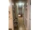 Clean hallway with tile flooring and access to bedrooms at 110 Hidden Arbor Ct, Sanford, FL 32773