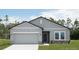 Beautiful two-story home with a two-car garage and stone accents at 3527 Fernanda Dr, Deltona, FL 32738