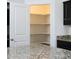 Walk-in pantry with corner shelving provides ample storage space at 3527 Fernanda Dr, Deltona, FL 32738
