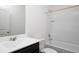 Bathroom with a single vanity, tub, and shower at 3527 Fernanda Dr, Deltona, FL 32738