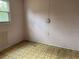 Bedroom with tile floors and neutral walls at 142 Park Blvd, New Smyrna Beach, FL 32168