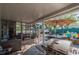 Outdoor patio with seating, grill, and umbrella at 2200 S Peninsula Dr, Daytona Beach, FL 32118
