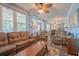 Cozy living room featuring comfortable seating and large windows at 2200 S Peninsula Dr, Daytona Beach, FL 32118