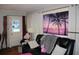 Living room with hardwood floors, comfortable seating, and large art at 607 N Dixie Fwy, New Smyrna Beach, FL 32168