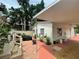Relaxing patio area with brick pavers and fire pit at 607 N Dixie Fwy, New Smyrna Beach, FL 32168