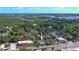 Aerial view showcasing home's location near water, highlighting its proximity to the coast at 607 N Dixie Fwy, New Smyrna Beach, FL 32168