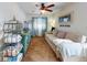 Living room featuring a comfortable sofa and large TV at 603 N Pine St, New Smyrna Beach, FL 32169