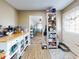 View from kitchen entryway into bedroom and pantry at 603 N Pine St, New Smyrna Beach, FL 32169