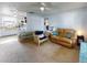Bright living room with comfortable seating and kitchen view at 603 N Pine St, New Smyrna Beach, FL 32169