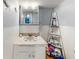 Bathroom with vanity, toilet, and decorative shelving at 603 N Pine St, New Smyrna Beach, FL 32169