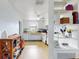 Bright kitchen with white cabinets, wood countertops, and ample storage at 603 N Pine St, New Smyrna Beach, FL 32169