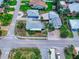 Aerial view of a home on a residential street at 603 N Pine St, New Smyrna Beach, FL 32169