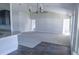 Open concept kitchen with island and dark cabinets at 243 Lagoon Mist Ct, Oak Hill, FL 32759