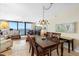 Ocean view dining area with table and chairs at 4139 S. Atlantic Ave # B504, New Smyrna Beach, FL 32169
