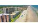 Aerial view of beachfront property and surrounding neighborhood at 4139 S. Atlantic Ave # B504, New Smyrna Beach, FL 32169