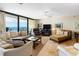 Spacious living room with ocean view and comfortable seating at 4139 S. Atlantic Ave # B504, New Smyrna Beach, FL 32169