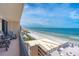 Stunning ocean view from balcony with beach and building details at 4139 S. Atlantic Ave # B504, New Smyrna Beach, FL 32169