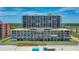 Aerial view of Moontide building, beachfront property with pool at 4139 S. Atlantic Ave # B504, New Smyrna Beach, FL 32169