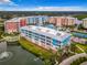 Multi-building complex with colorful exteriors and waterfront access at 1 Riverwalk Dr # 302, New Smyrna Beach, FL 32169
