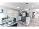 Modern kitchen featuring stainless steel appliances and granite countertops at 1355 Powers Ave, Daytona Beach, FL 32117