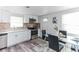 Updated kitchen with stainless steel appliances and granite counters at 1355 Powers Ave, Daytona Beach, FL 32117