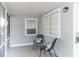 Cozy screened porch with two chairs for relaxing at 1355 Powers Ave, Daytona Beach, FL 32117