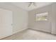 Simple bedroom with tile floors and window at 6468 Engram Rd, New Smyrna Beach, FL 32169