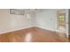 Hardwood floor bedroom with access to another room at 6468 Engram Rd, New Smyrna Beach, FL 32169