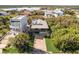 Elevated view of a two-story house and surrounding neighborhood at 6468 Engram Rd, New Smyrna Beach, FL 32169