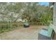 Wooden deck with seating area and shade at 6468 Engram Rd, New Smyrna Beach, FL 32169