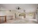 Open living area with vaulted ceilings and tile floors at 6468 Engram Rd, New Smyrna Beach, FL 32169
